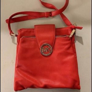 Micheal Kor red crossbody bag